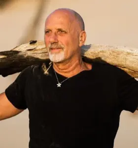 Yossi Ghinsberg - Yossi Ghinsberg is an internationally renowned storyteller, author, and humanitarian whose extraordinary survival in the Amazon rainforest is a powerful metaphor for resilience and adaptability.
